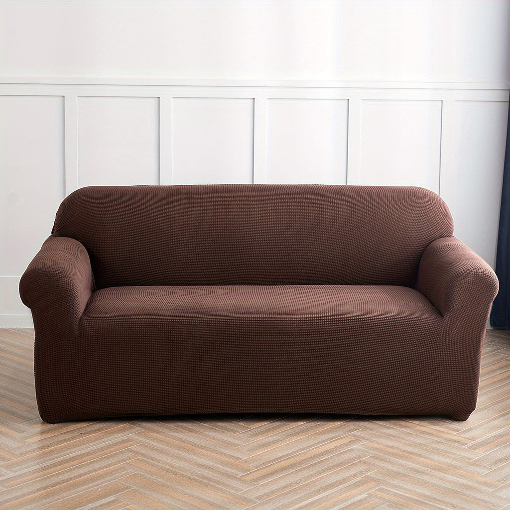 Calma sofa cover in Dark Coffee, front view of the fitted sofa cover