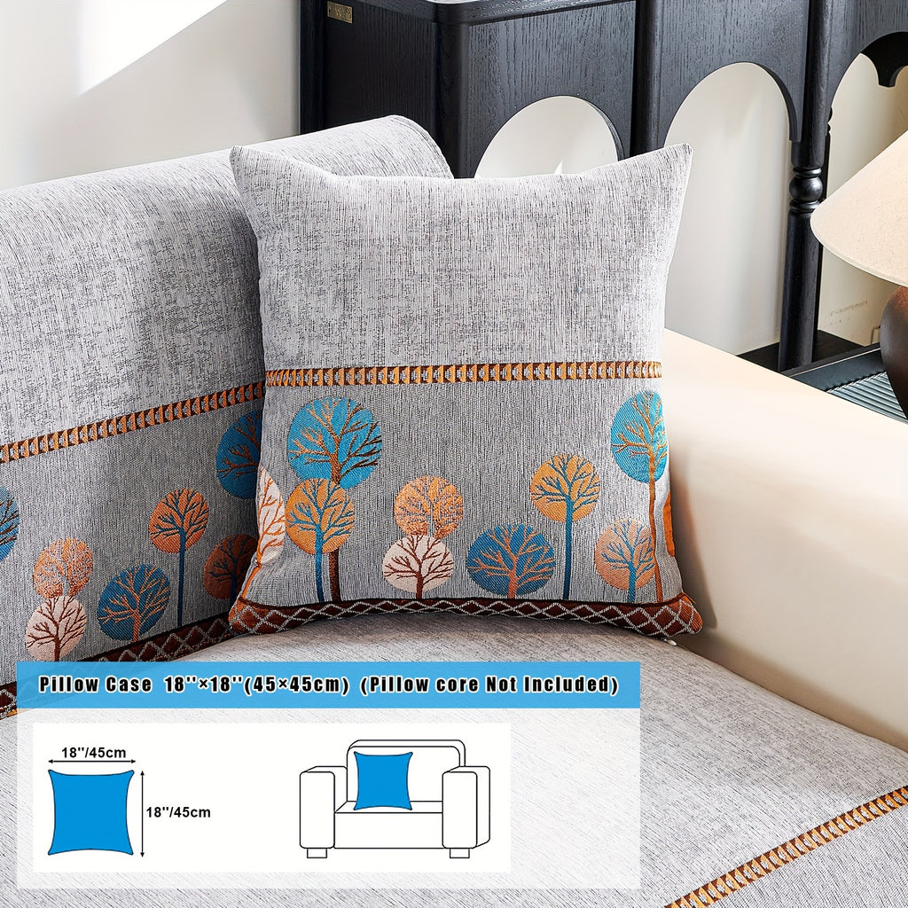 Sienna in Gray: tree-pattern pillowcase pictured on a cushion with a 45 × 45 cm label