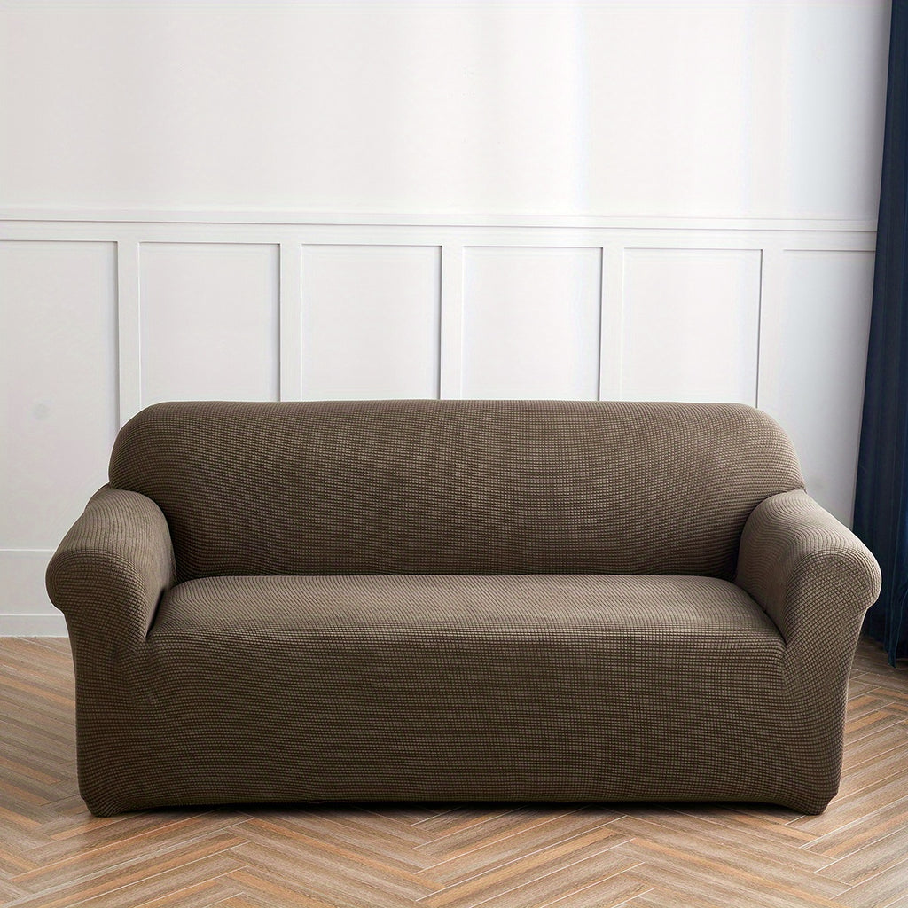 Calma sofa cover in Light Coffee, front view of the fitted sofa cover
