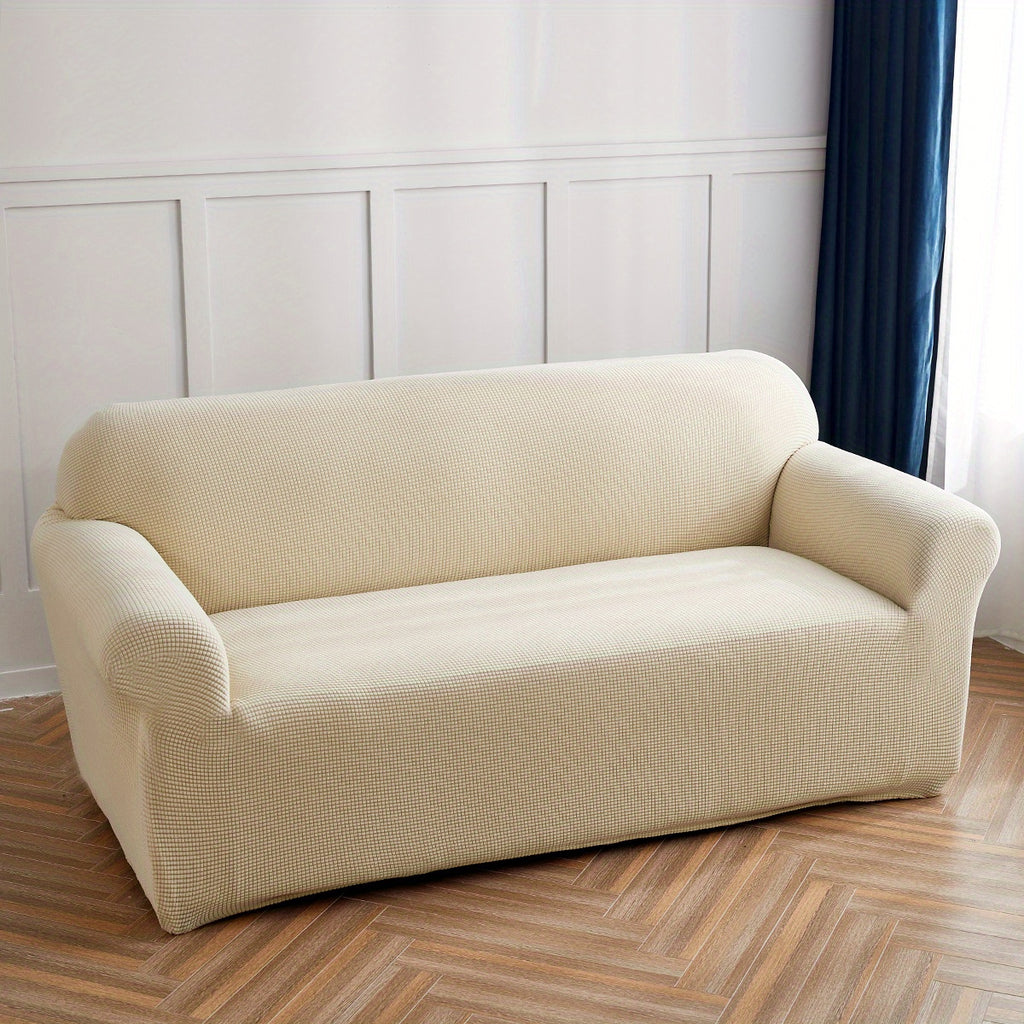 Calma sofa cover in Beige Yellow, wide view over the seat and arms
