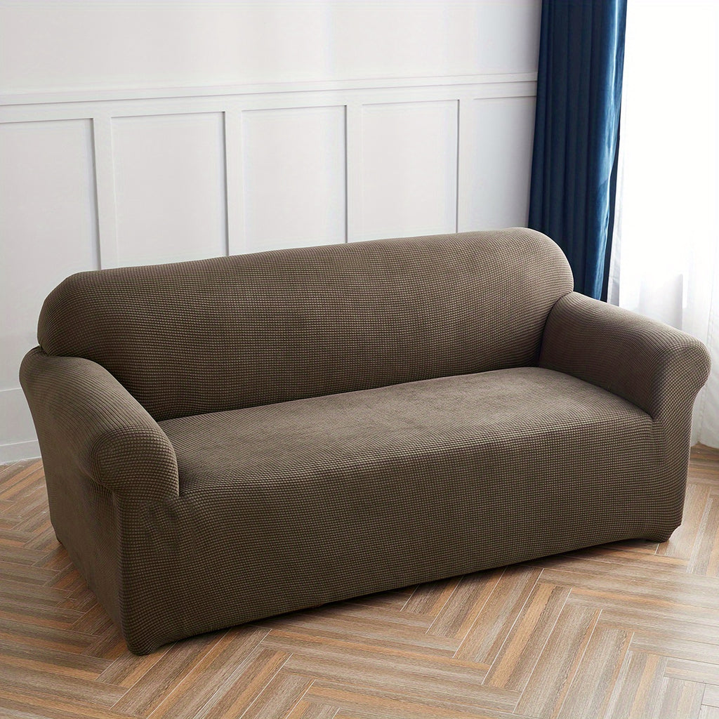 Calma sofa cover in Light Coffee, wide view over the seat and arms