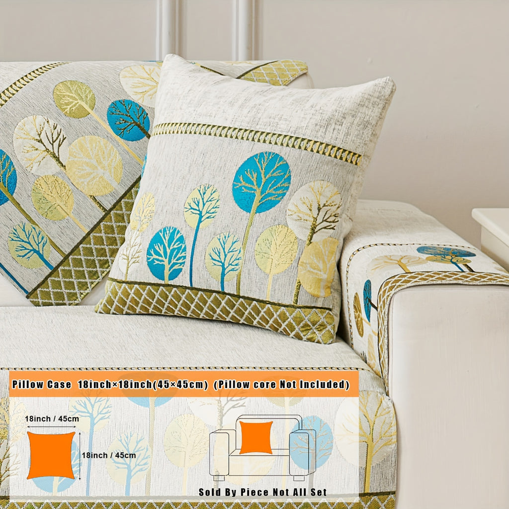 Moonlit in White: tree-pattern pillowcase pictured on a cushion, with a 45 × 45 cm label