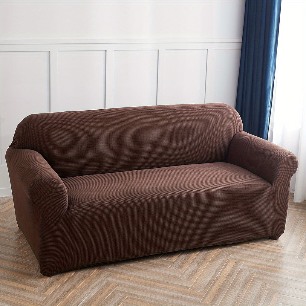 Calma sofa cover in Dark Coffee, wide view over the seat and arms