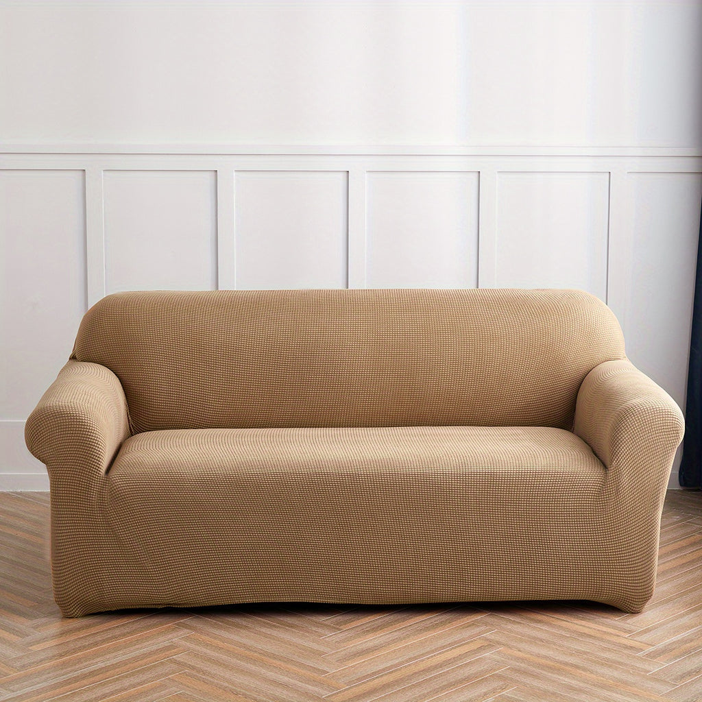 Calma sofa cover in Khaki 1, front view of the fitted sofa cover
