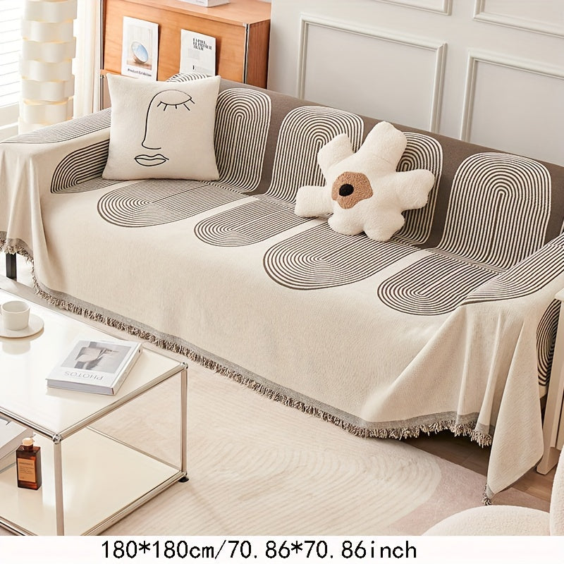 Coffee Marlow throw on a sofa; the image caption reads 180*180cm