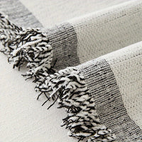 Boho-inspired sofa cover with soft chenille

