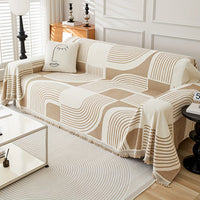 Fringe-accented boho couch cover

