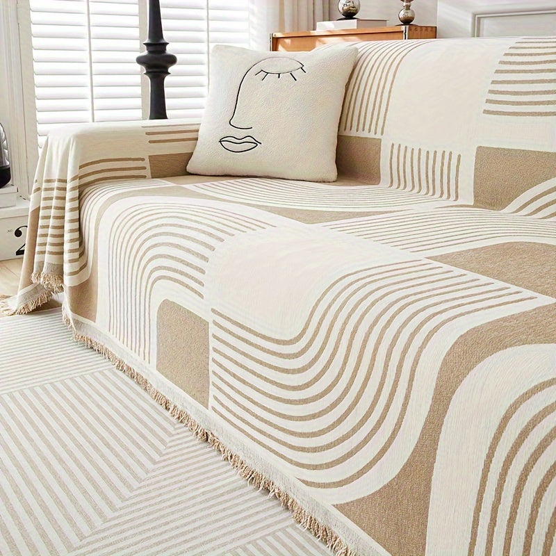 Fringe-trimmed waterproof couch cover

