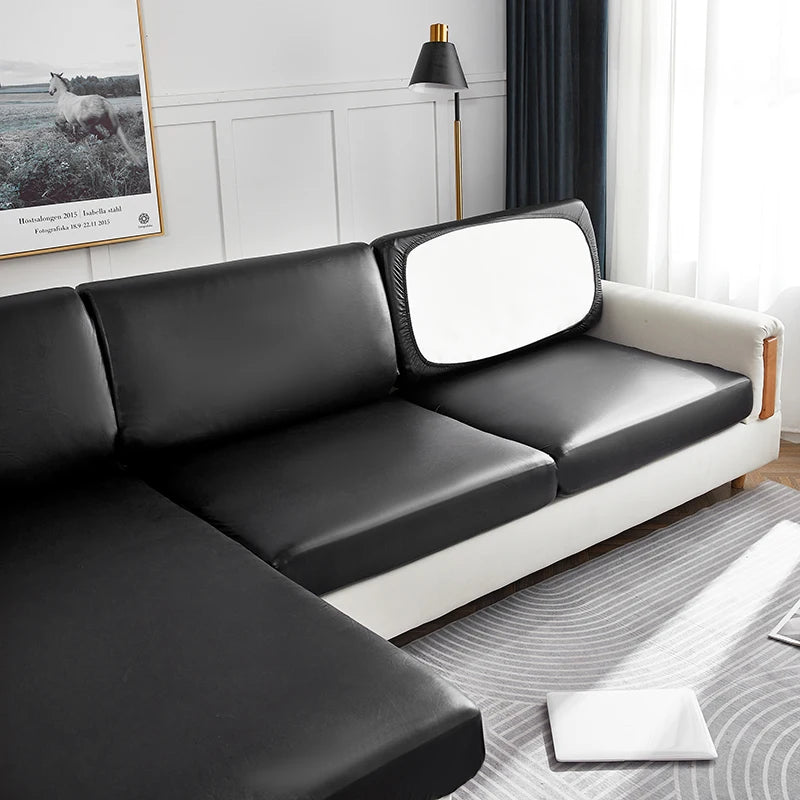 Black Nero covers on separate seat, back and chaise cushions, with one back cushion turned around, shown for color 12