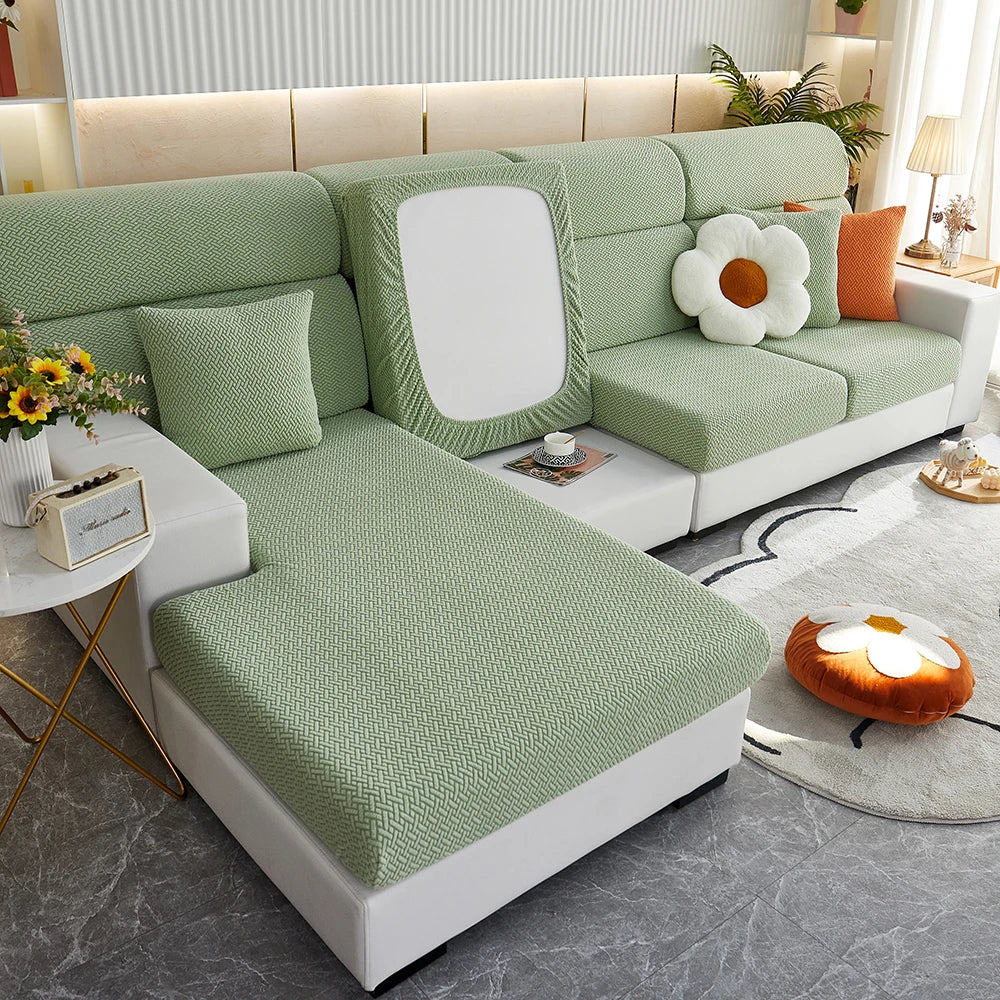 Sage green Milan covers fitted over individual sofa cushions