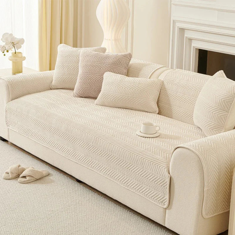 Umbria cream beige chevron-pattern cover pieces arranged on a sofa