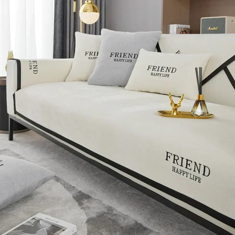 Cream Kensington panels across a sofa with dark edging and FRIEND lettering