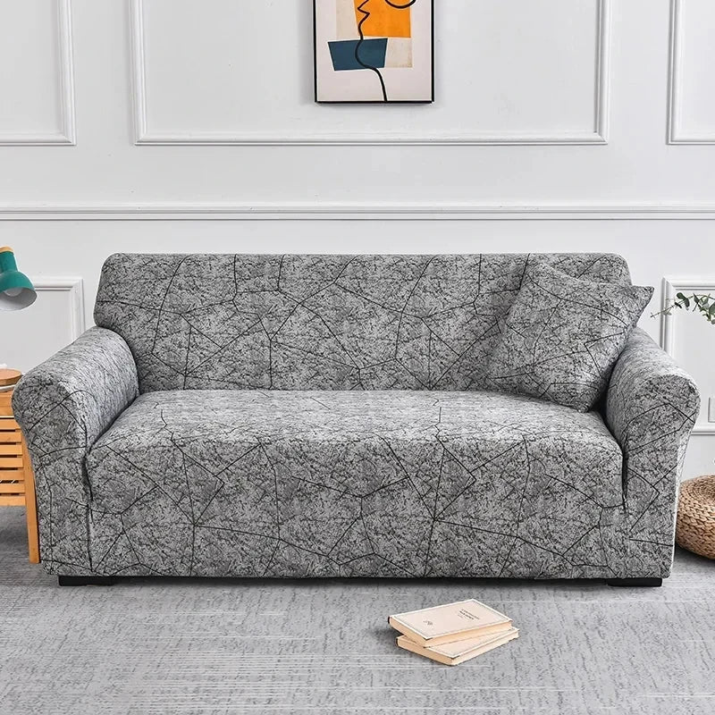 Sofa fitted with Celeste Color 14 cover showing fine dark branching lines on grey