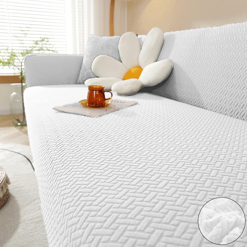 White Verona Geometric cover across a sofa seat, backrest and arm, with raised interlocking texture