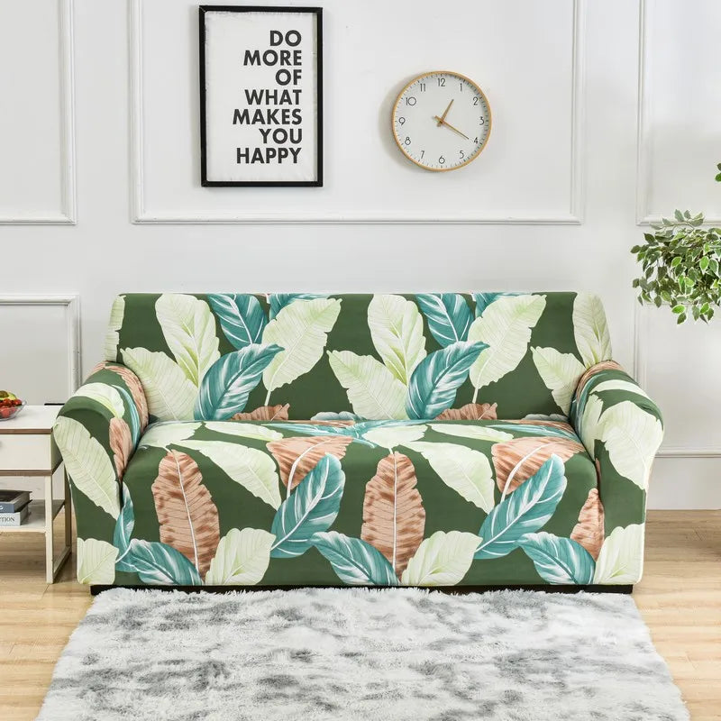 Sofa fitted with Celeste Color 10 cover showing large green, cream and tan leaves