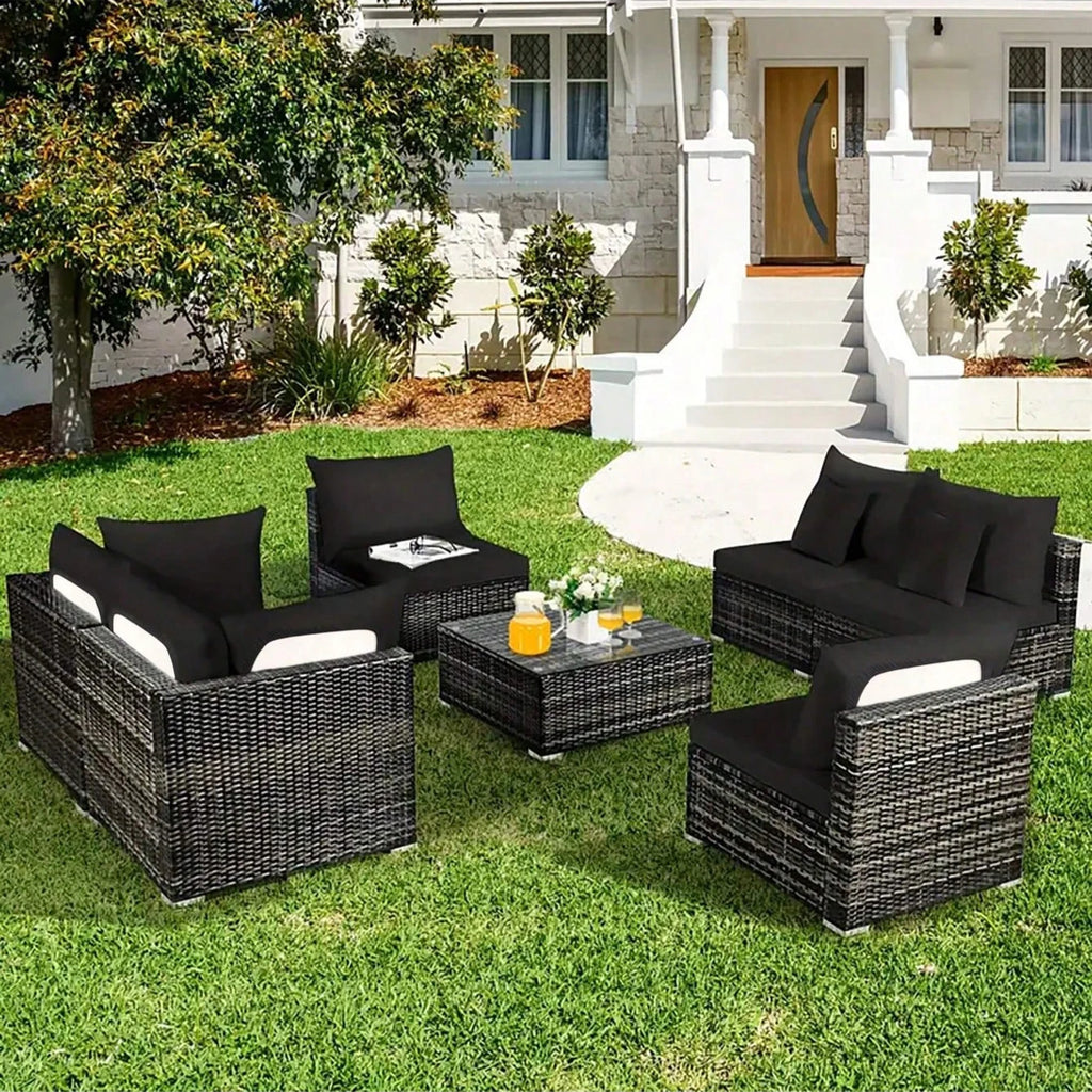 Black Daintree seat and back cushion covers on a garden seating set.