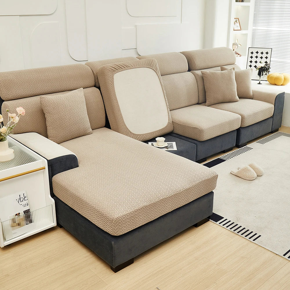 Beige Milan cushion covers arranged on a sofa