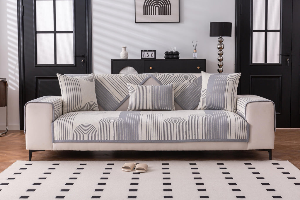 Sofa Decor Arcadia Arch Line Sofa Cover in Black Cream - styled sofa image for water resistant patterned couch covers in Australia