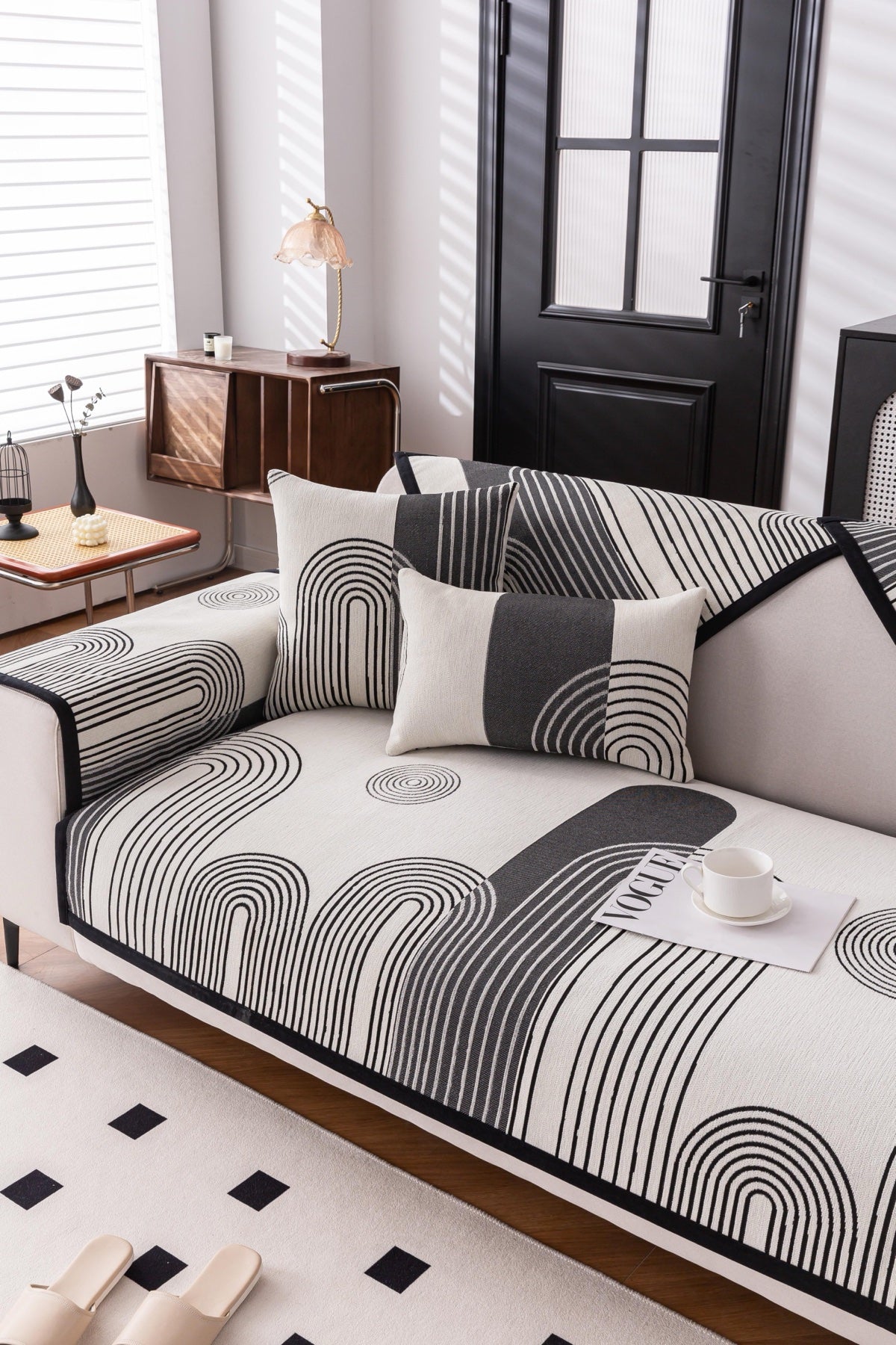 Sofa Decor Arcadia Arch Line Sofa Cover in Black Cream - styled sofa image for water resistant patterned couch covers in Australia