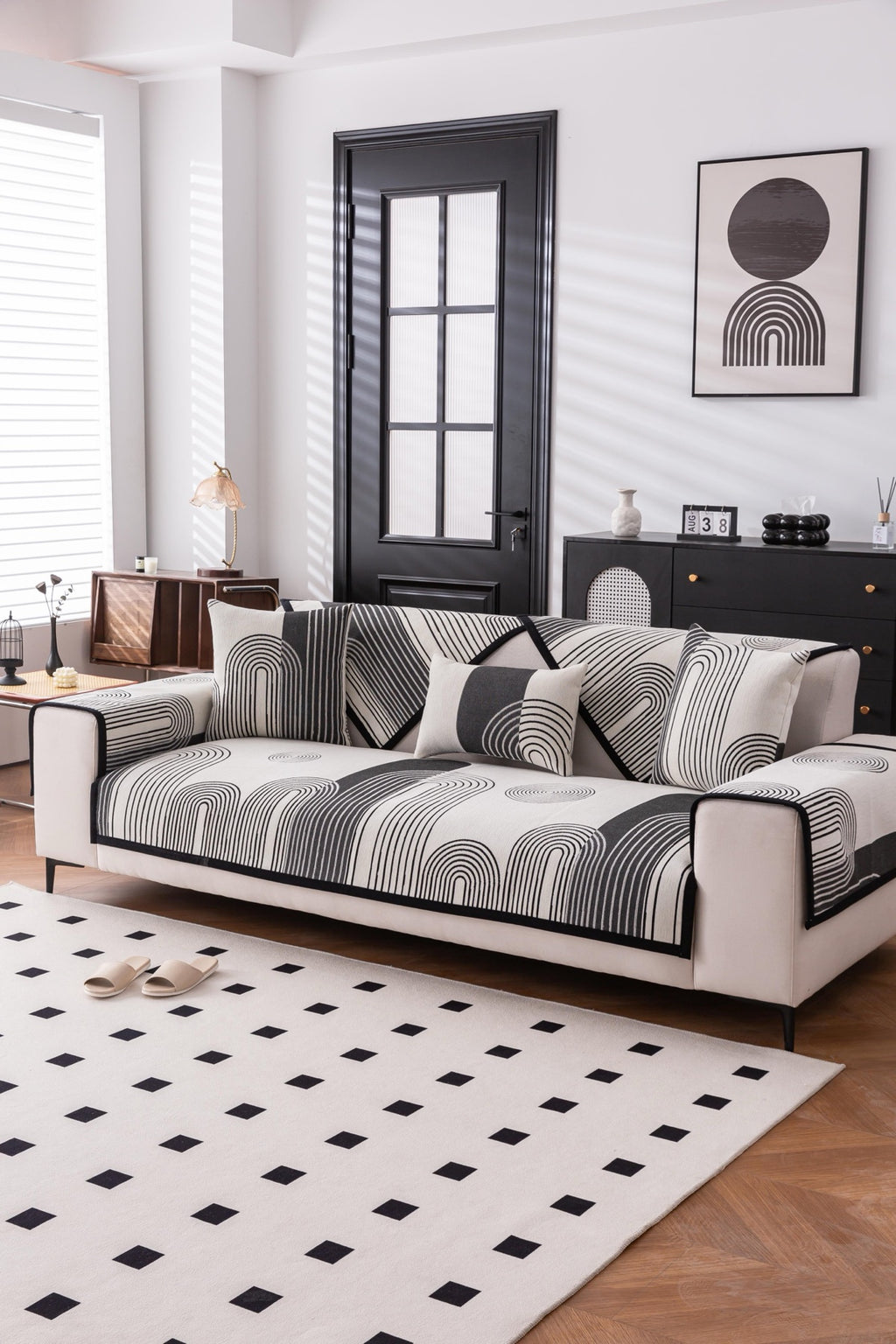 Sofa Decor Arcadia Arch Line Sofa Cover in Black Cream - styled sofa image for water resistant patterned couch covers in Australia