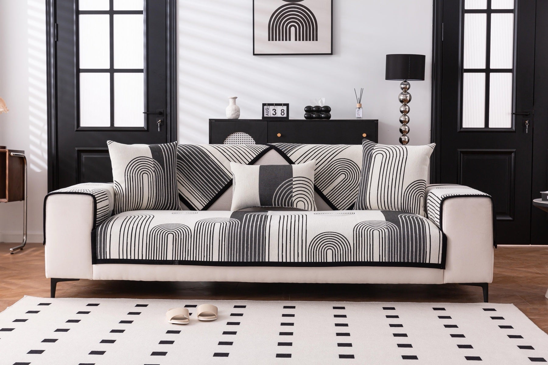 Sofa Decor Arcadia Arch Line Sofa Cover in Black Cream - styled sofa image for water resistant patterned couch covers in Australia
