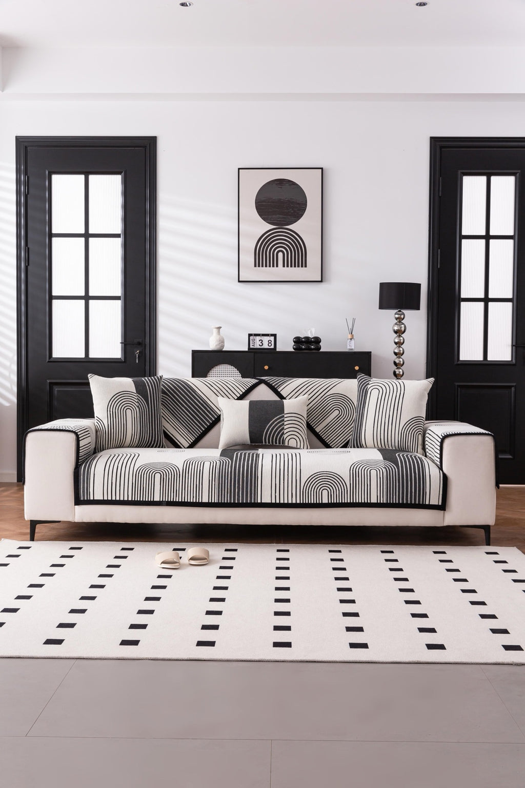 Sofa Decor Arcadia Arch Line Sofa Cover in Black Cream - styled sofa image for water resistant patterned couch covers in Australia