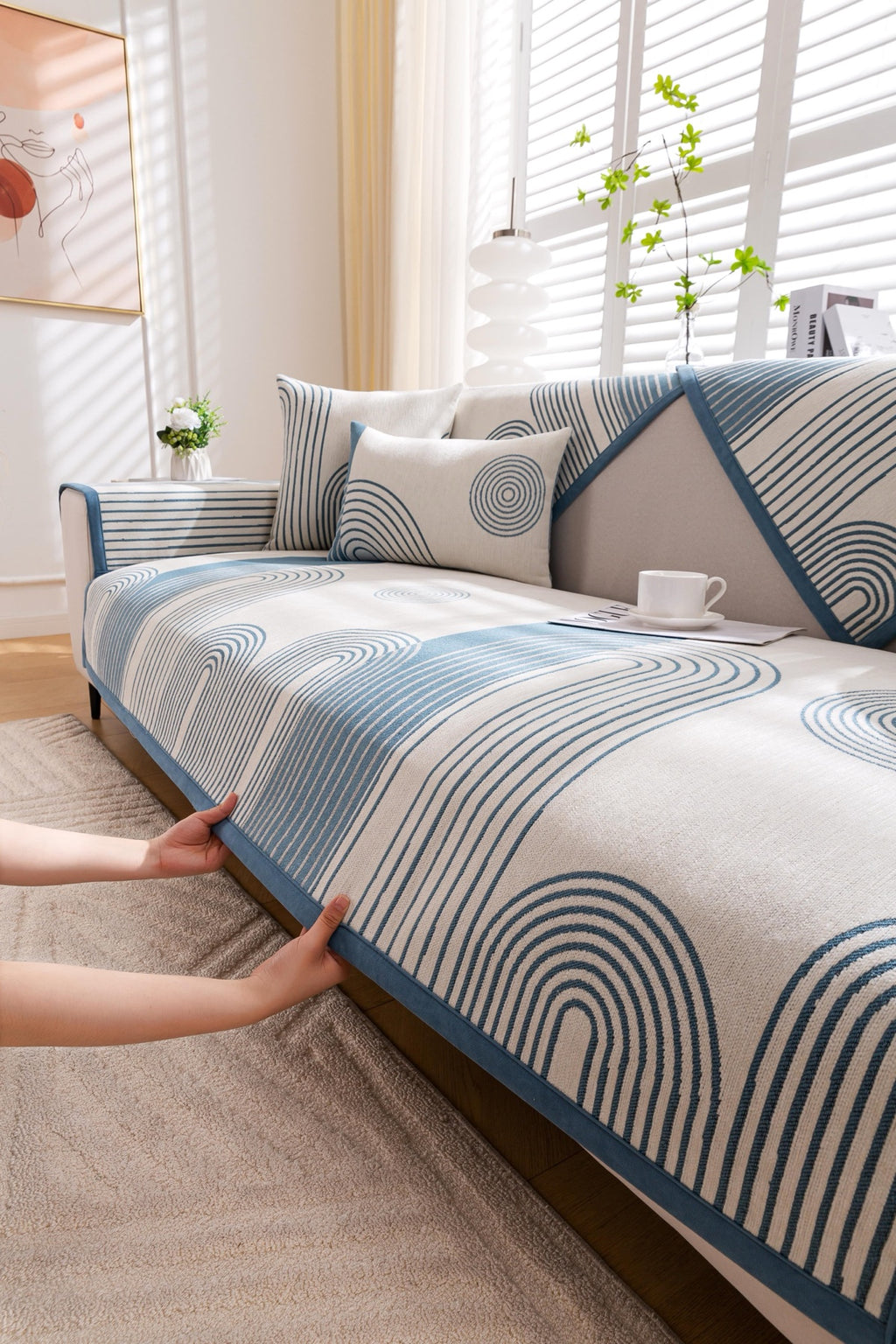 Sofa Decor Arcadia Arch Line Sofa Cover in Blue Cream - styled sofa image for water resistant patterned couch covers in Australia