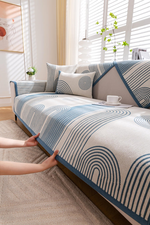 Sofa Decor Arcadia Arch Line Sofa Cover in Blue Cream - styled sofa image for water resistant patterned couch covers in Australia