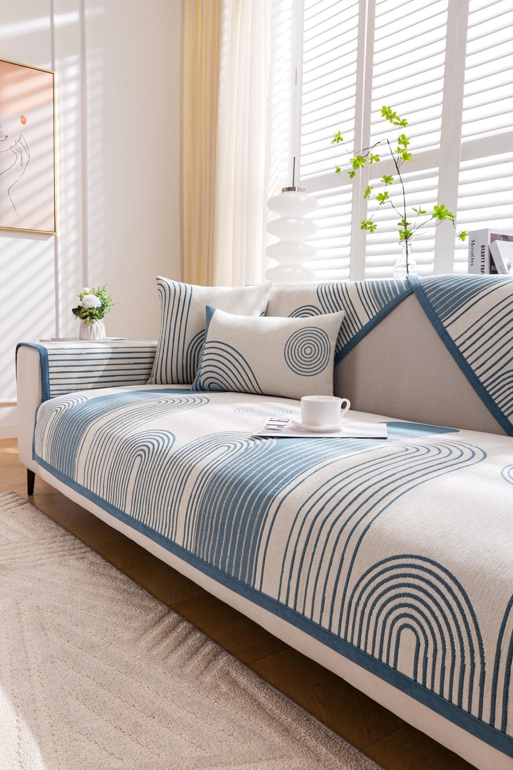 Sofa Decor Arcadia Arch Line Sofa Cover in Blue Cream - styled sofa image for water resistant patterned couch covers in Australia
