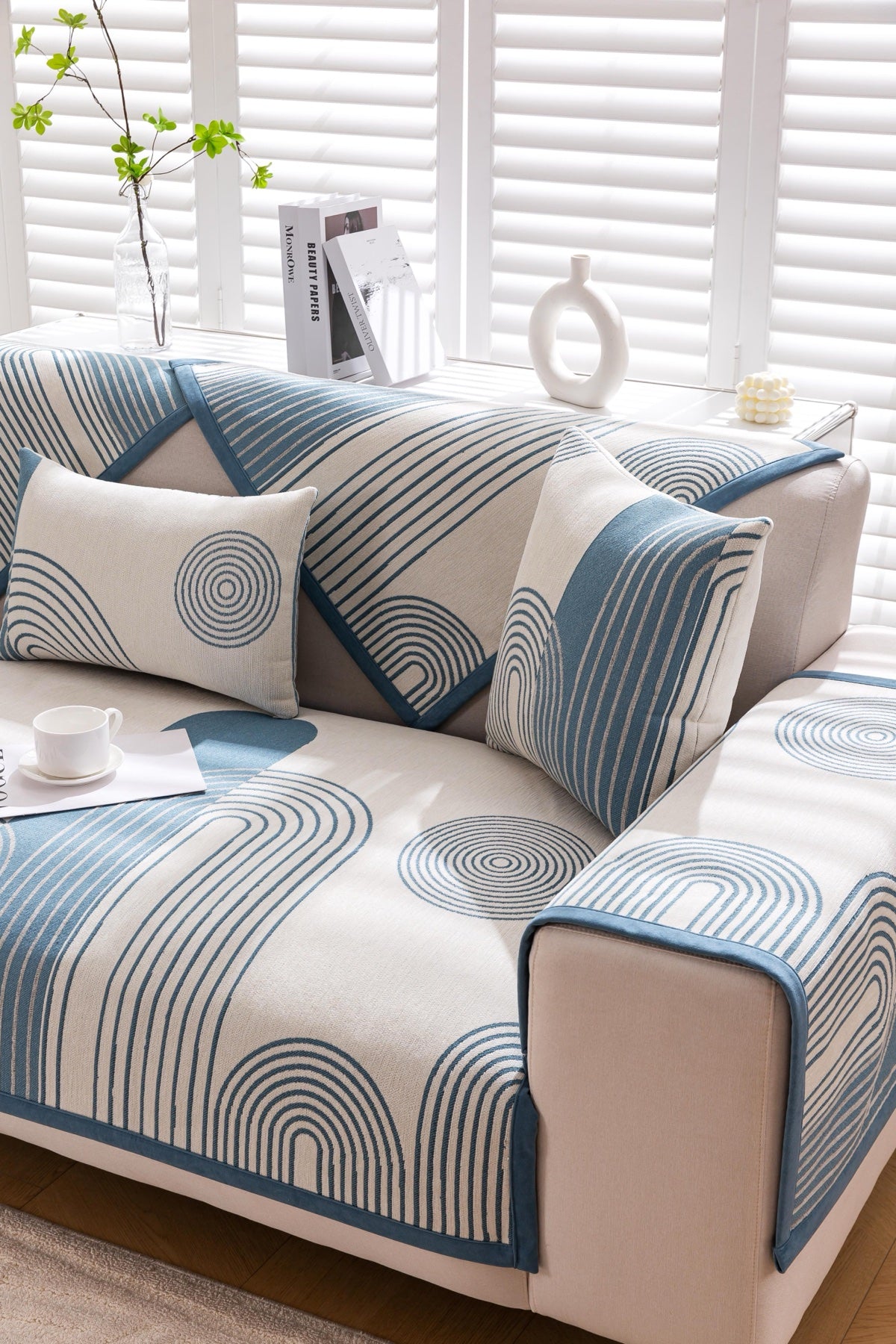 Sofa Decor Arcadia Arch Line Sofa Cover in Blue Cream - styled sofa image for water resistant patterned couch covers in Australia