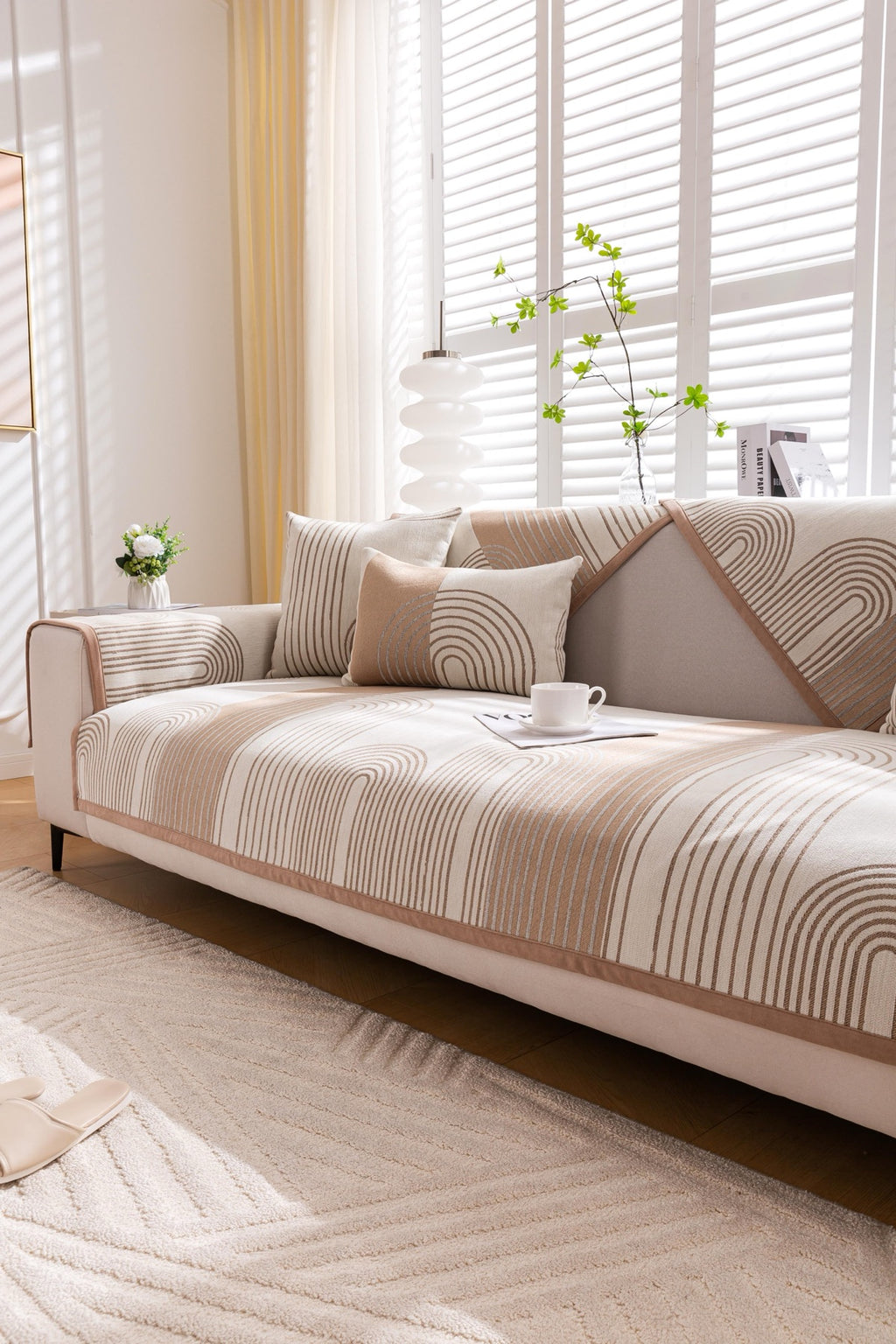 Sofa Decor Arcadia Arch Line Sofa Cover in Taupe Cream - styled sofa image for water resistant patterned couch covers in Australia