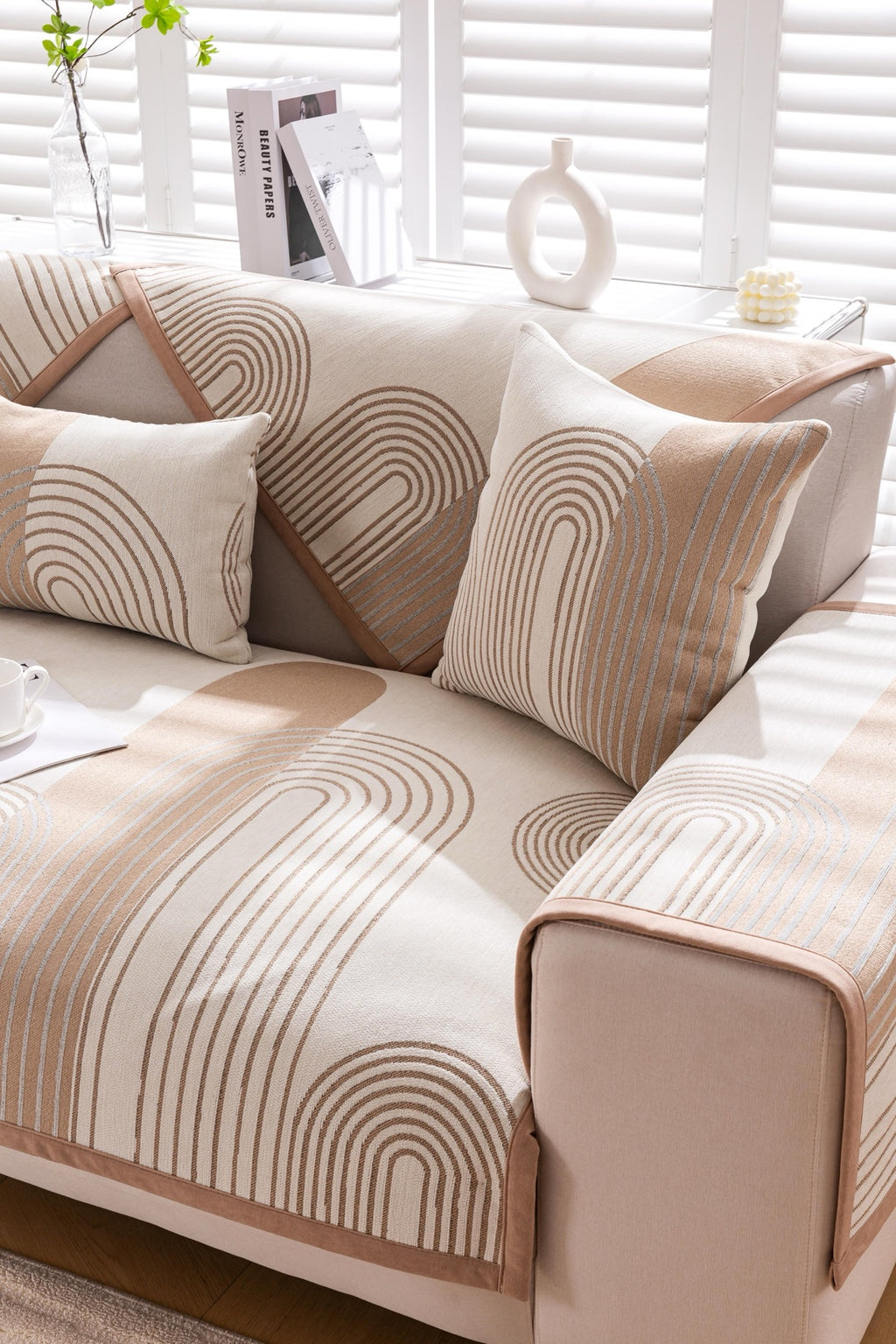 Sofa Decor Arcadia Arch Line Sofa Cover in Taupe Cream - styled sofa image for water resistant patterned couch covers in Australia