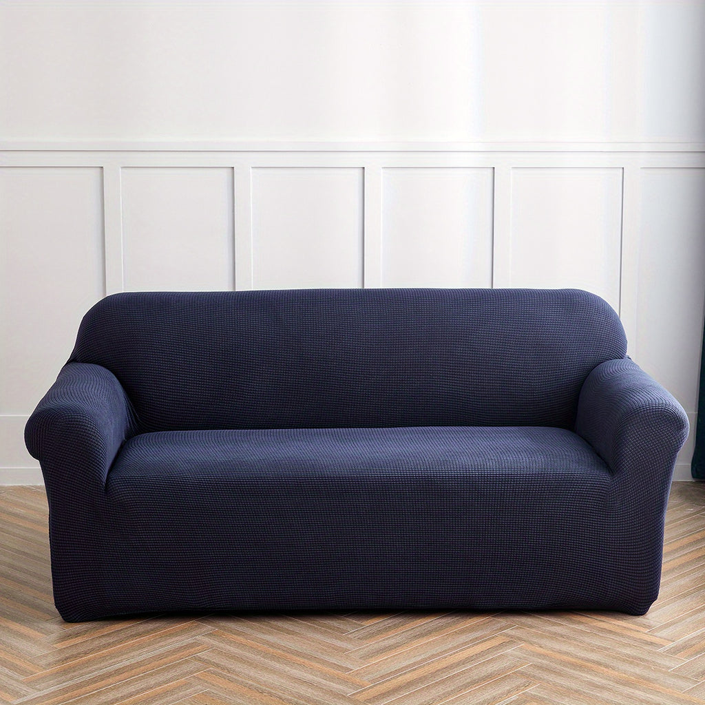 Calma sofa cover in navy blue, front view of the fitted sofa cover