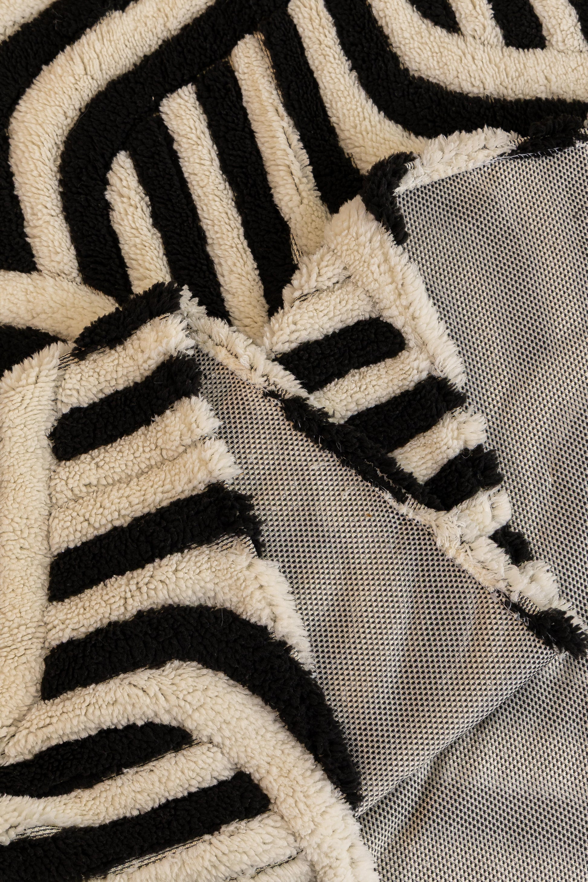 Sofa Decor Riviera Wave Stripe Sofa Cover in Black Cream - fabric detail image for plush patterned couch covers in Australia