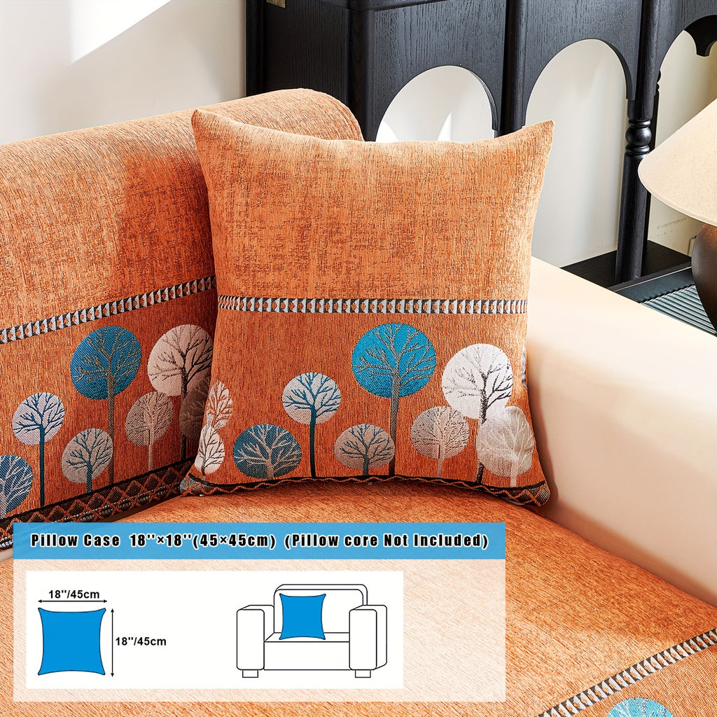 Sienna in Orange: tree-pattern pillowcase pictured on a cushion with a 45 × 45 cm label