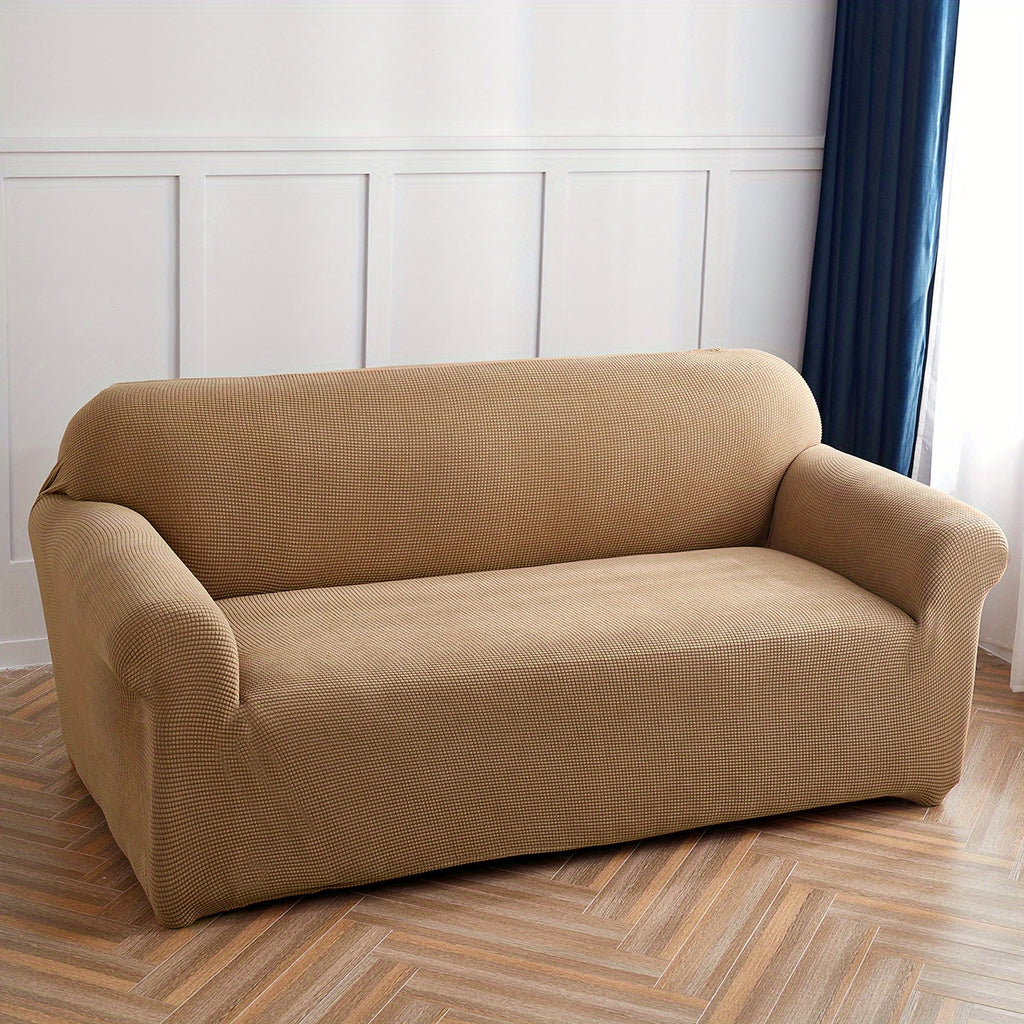 Calma sofa cover in Khaki 1, wide view over the seat and arms
