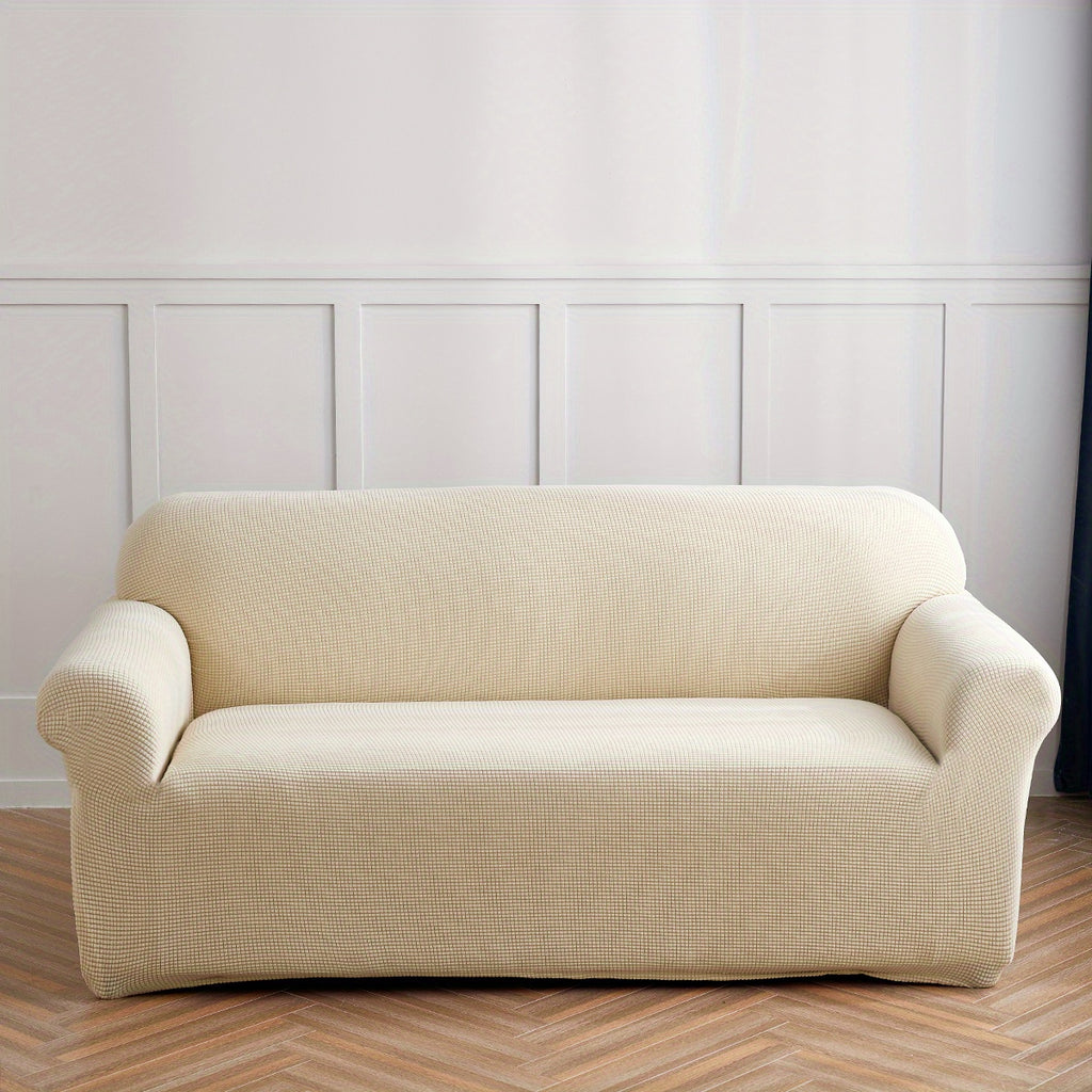 Calma sofa cover in Beige Yellow, front view of the fitted sofa cover