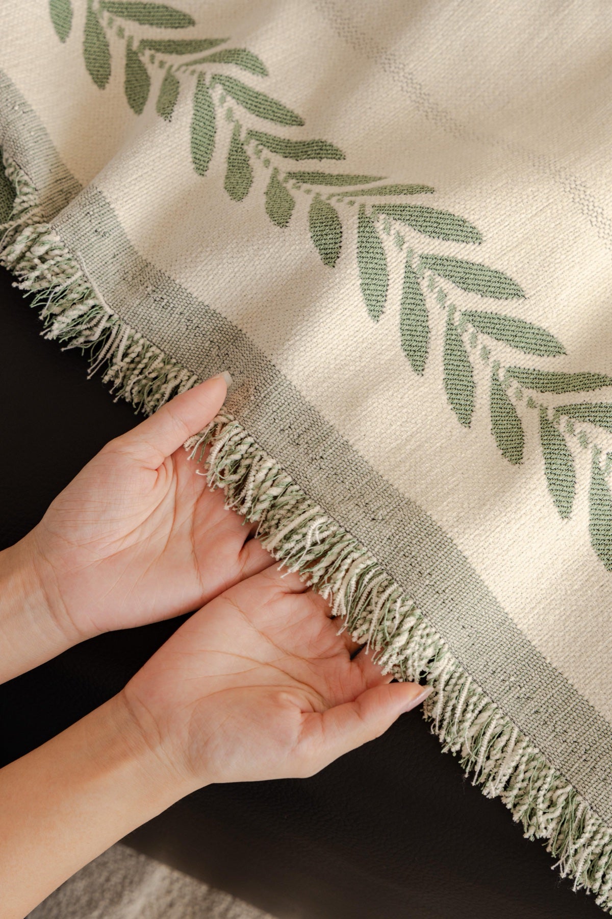 Sofa Decor Elowen Olive Border Sofa Throw Cover in Olive Border - olive border sofa throw cover hand and drape closeup in Australia, image 14