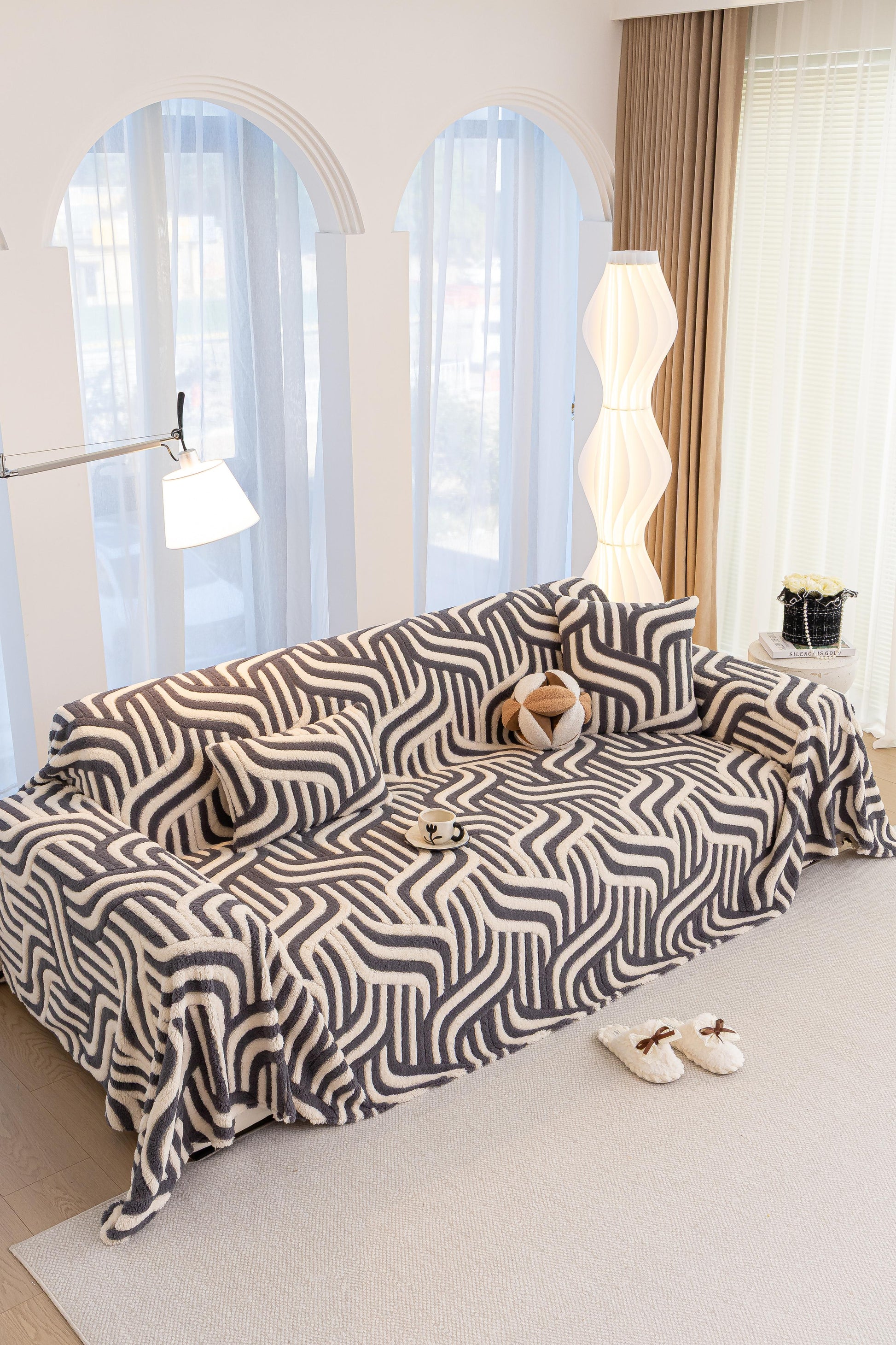 Sofa Decor Riviera Wave Stripe Sofa Cover in Grey Cream - styled sofa image for plush patterned couch covers in Australia