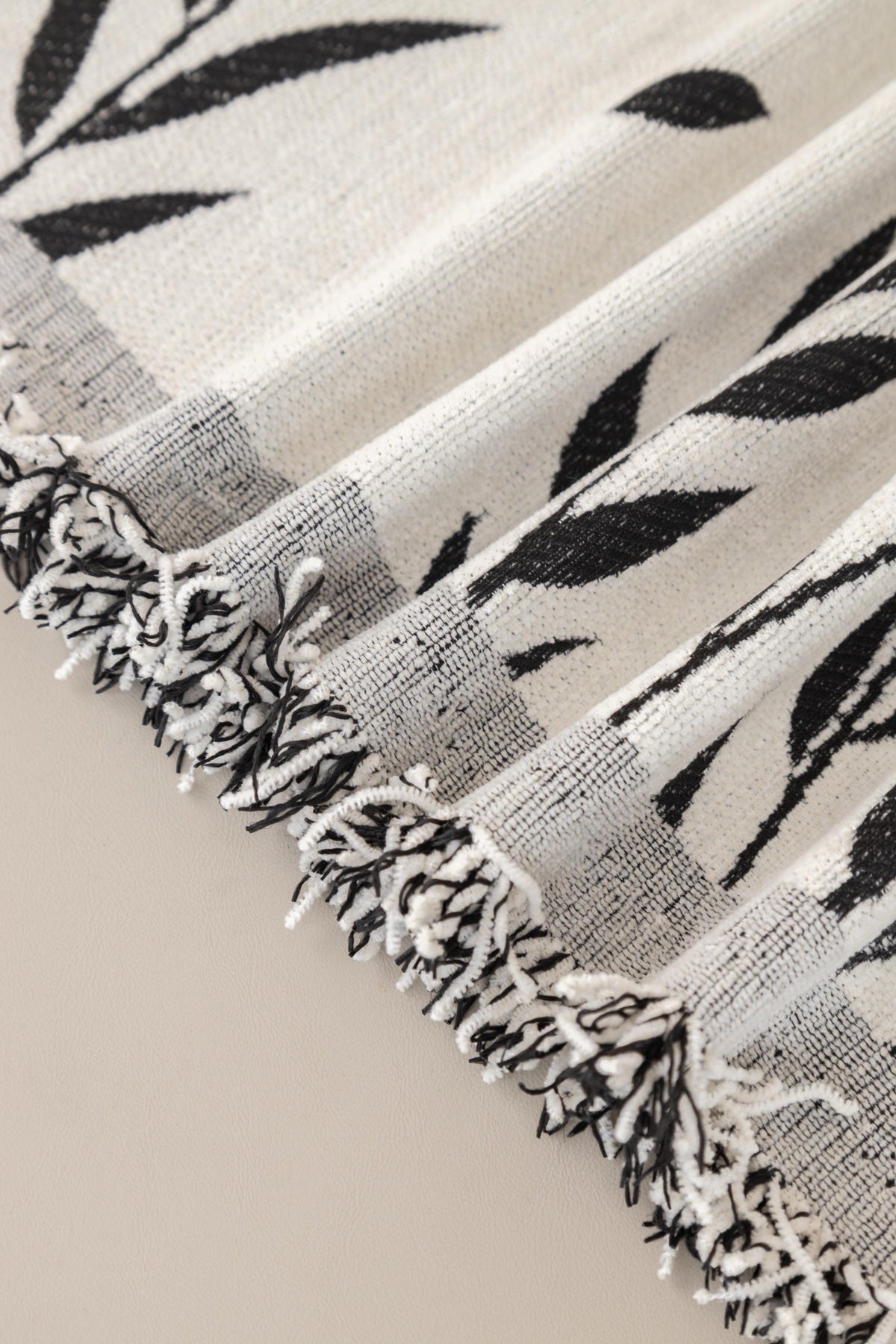 Sofa Decor Oliva Leaf Fringe Sofa Throw Cover in Black Leaf - leaf pattern sofa throw cover fabric and edge detail in Australia, image 30