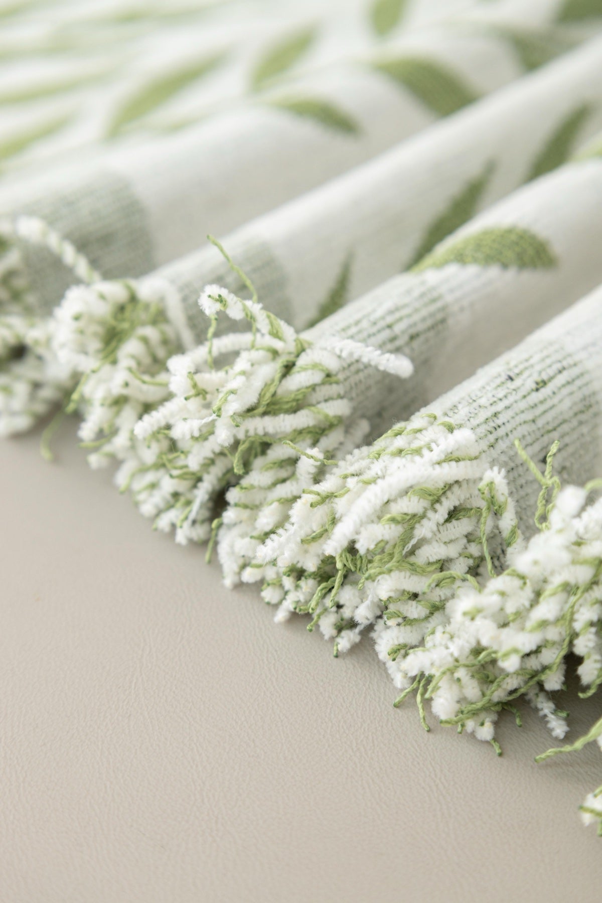 Sofa Decor Oliva Leaf Fringe Sofa Throw Cover in Sage Leaf - leaf pattern sofa throw cover fabric and edge detail in Australia, image 1