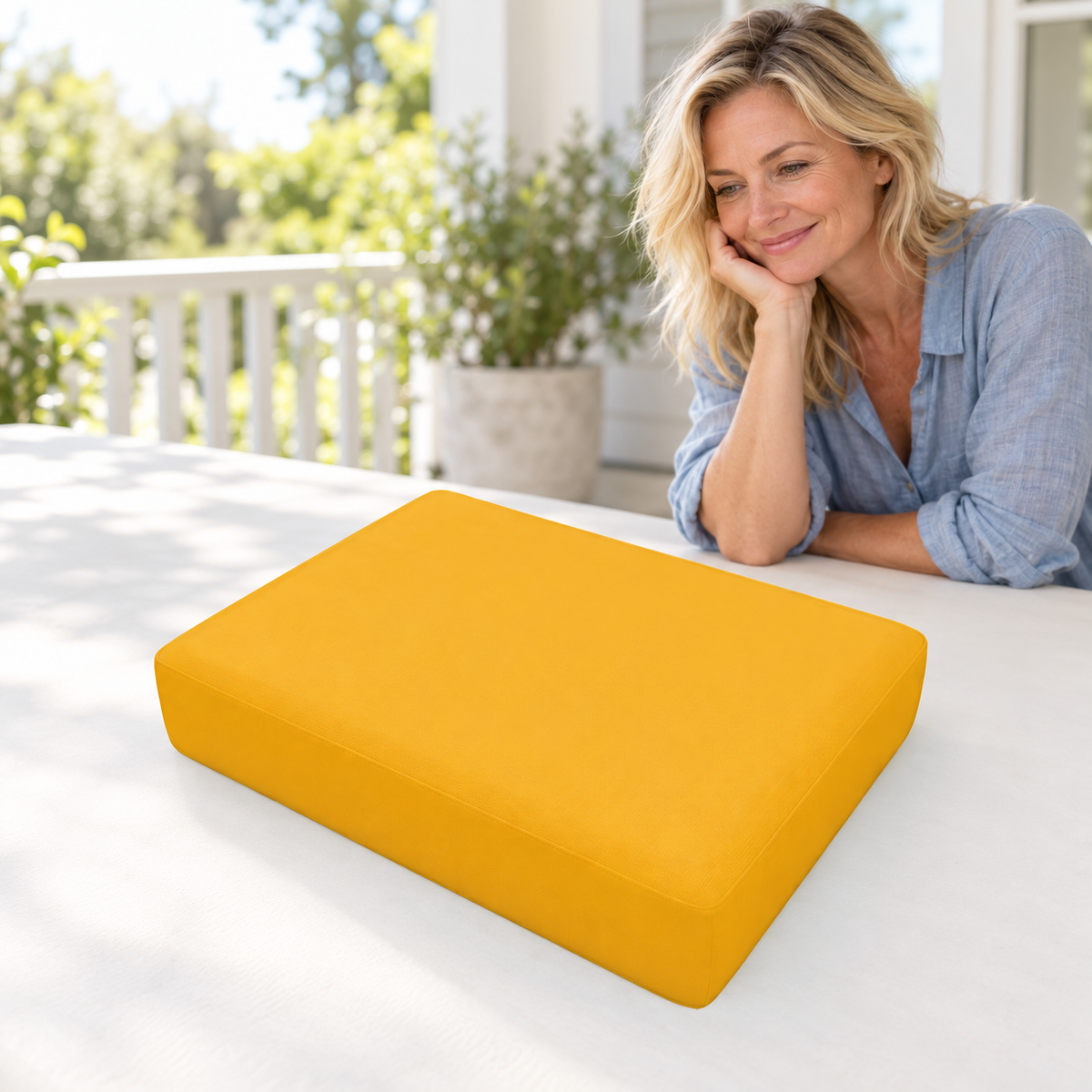 Sofa Decor Avalon Water Resistant Outdoor Chair Covers in 5, styled with a blonde woman.
