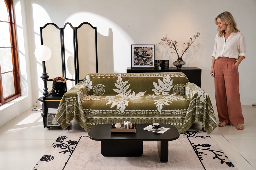 Sofa Decor Amalfi Palm Jacquard Sofa Throw Cover in Olive Palm, styled with a blonde woman.
