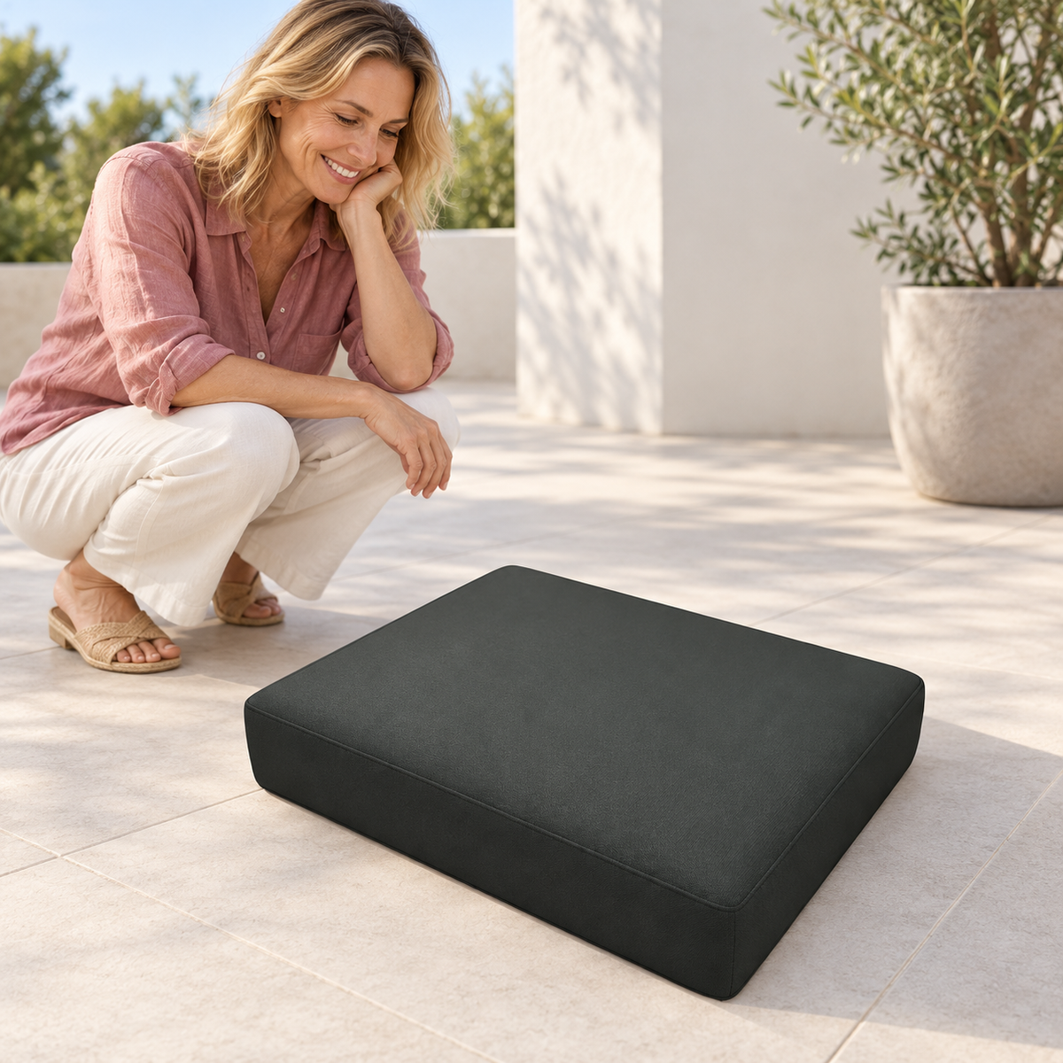 Sofa Decor Avalon Water Resistant Outdoor Chair Covers in 10, styled with a blonde woman.