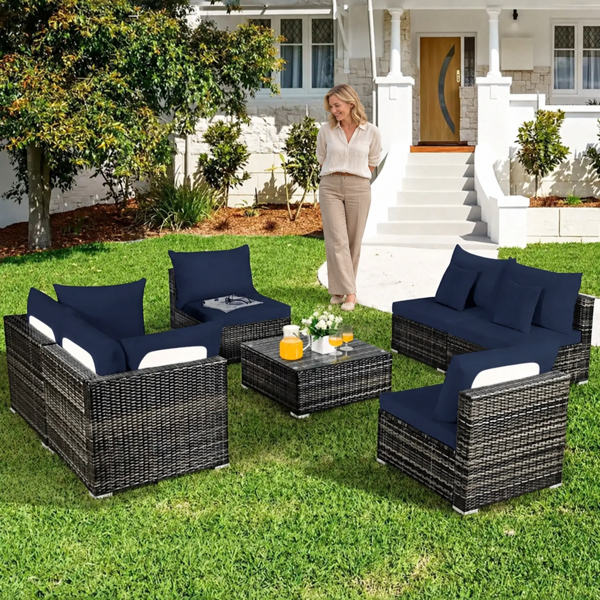 Sofa Decor Daintree Tropical Cushion Protectors in dark blue, styled with a blonde woman.