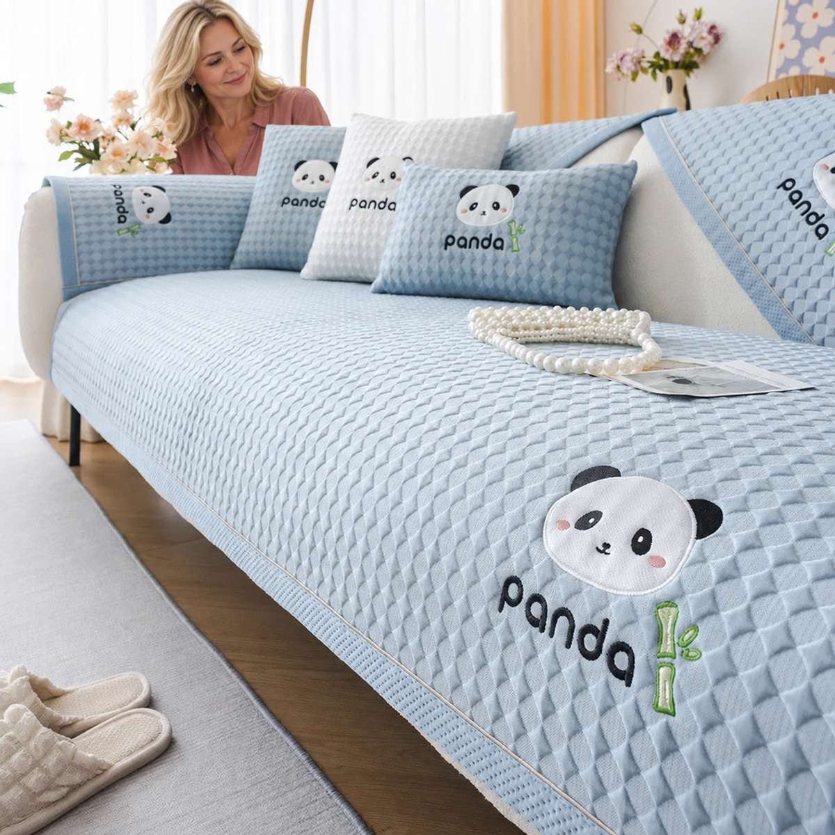 Sofa Decor Juno Ice Silk Sofa Mat in Light blue, styled with a blonde woman.