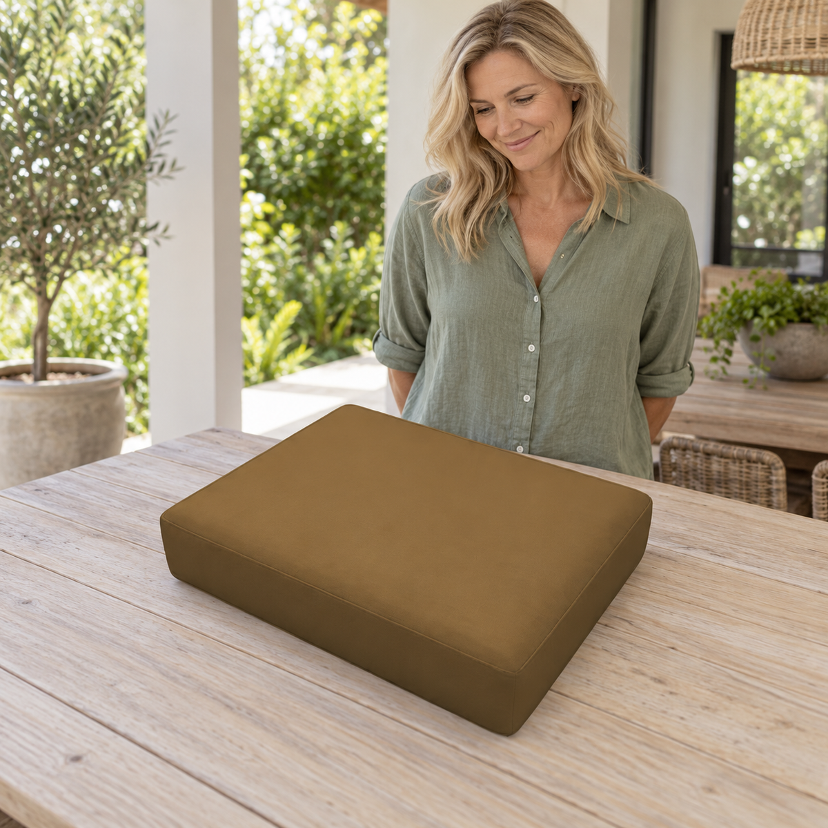 Sofa Decor Avalon Water Resistant Outdoor Chair Covers in 9, styled with a blonde woman.