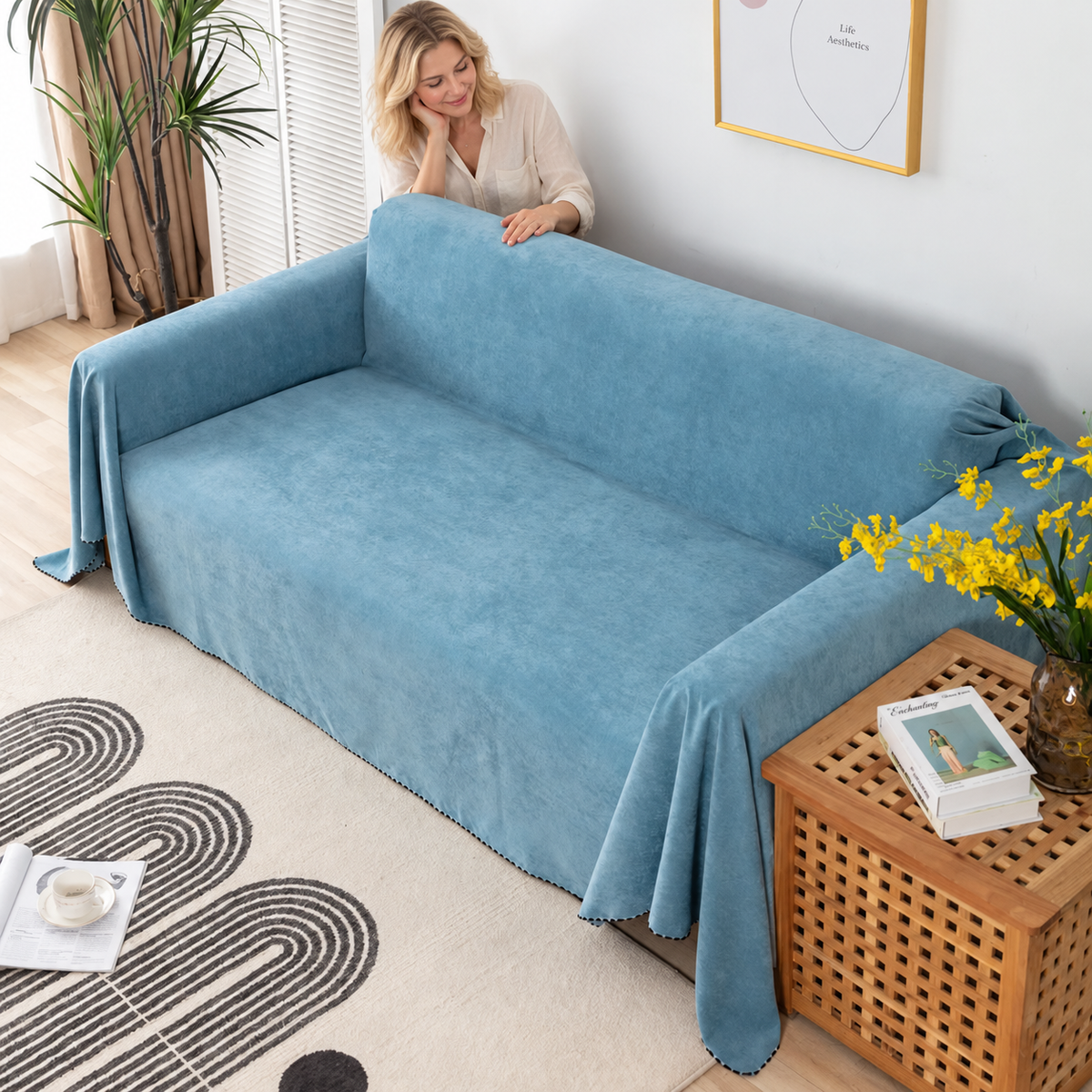 Sofa Decor Slate Water Resistant Sofa Blanket Cover in light blue, styled with a blonde woman.