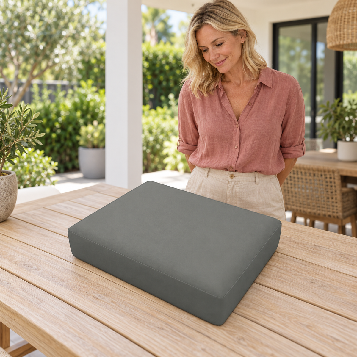 Sofa Decor Avalon Water Resistant Outdoor Chair Covers in 8, styled with a blonde woman.